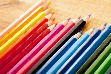 Colorful Drawing Pencils on Wooden Surface