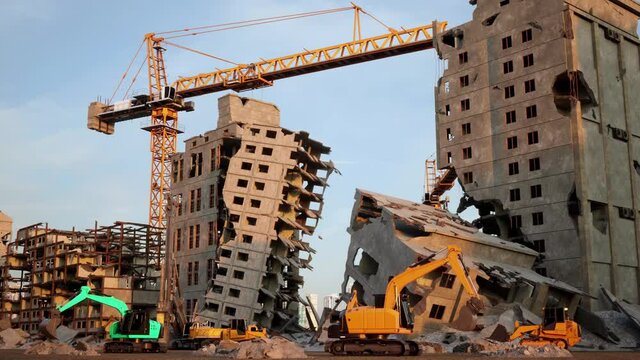 Heavy construction machinery clearing up the damage in the aftermath of a terrorist attack on multistory city buildings.