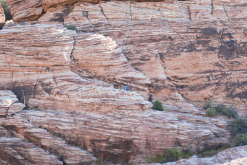Man Hiking on Red Rocks Just Outside of Las Vegas Nevada in the Dessert