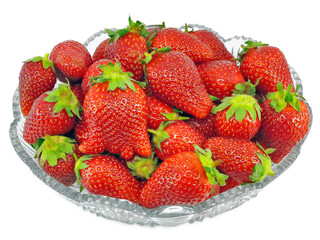 Fresh strawberries in a glass bowl - bowl full of strawberries white background