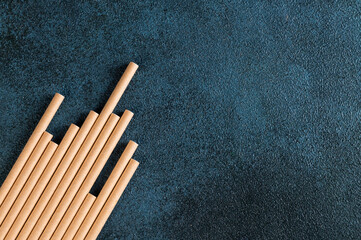Eco friendly Reusable Straw. Paper cocktail tubes. Kraft paper straw for drinking coffee or tea. Disposable cocktail tube. Zero waste concept.