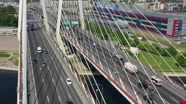 Aerial view of cable-stayed bridge with cars in St.Petersburg, 4k