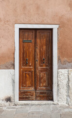 Fototapeta na wymiar Old front door. Venice in Italy.