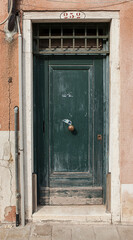 Old front door. Venice in Italy.