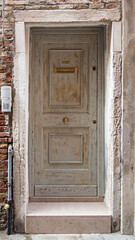 Old front door. Venice in Italy.