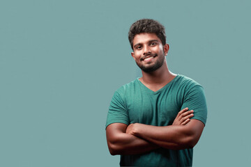 Portrait of a smiling young man of Indian origin