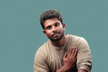 Portrait of a smiling young man of Indian origin