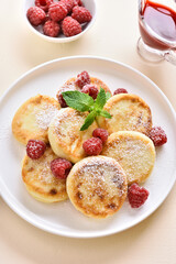 Cottage cheese pancakes with fresh raspberries