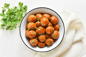 Meatballs with tomato sauce in bowl