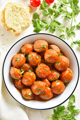Meatballs with tomato sauce in bowl