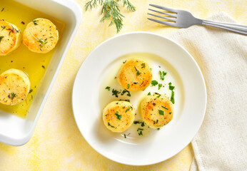 Fondant potatoes on plate
