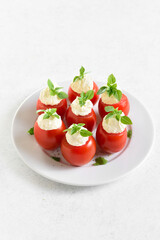 Tomatoes stuffed with cream cheese