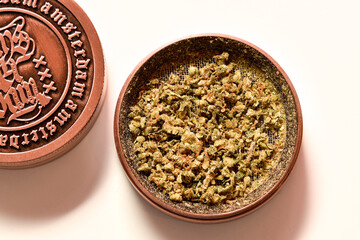Grinder with cannabis , Marijuana buds