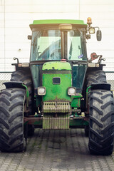 Old rusty vintage agricultural tractor with amazing design