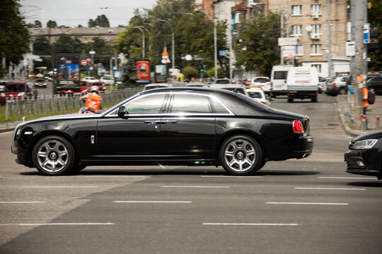 Kiev, Ukraine - June 19, 2021: Luxury premium British Rolls Royce Ghost on the road
