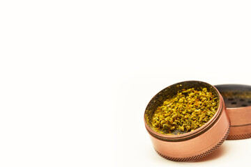 Grinder with cannabis , Marijuana buds
