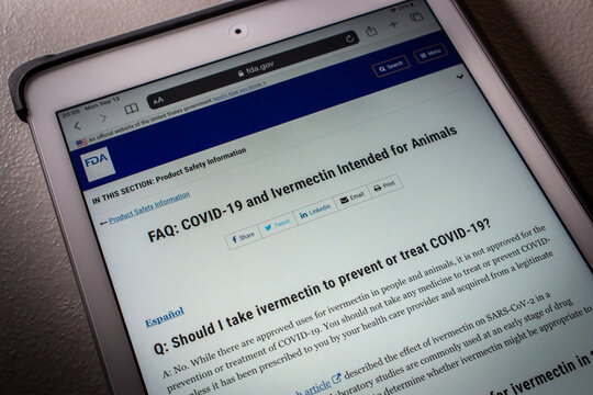 Kumamoto, JAPAN - Sep 13 2021 : Closeup "FAQ: COVID-19 and Ivermectin Intended for Animals" in the US Food and Drug Administration (FDA) website on tablet in dark mood.
