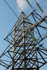 Tower of High-Voltage Power Lines with the Sky Background