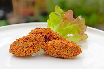 
Download preview
Three falafel balls and salad on a plate, middle eastern food. selective focus
