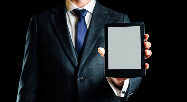 E reader. Digital e book, library reader tablet in business man hand. Online education course, E learning class and ebook digital technology concept.