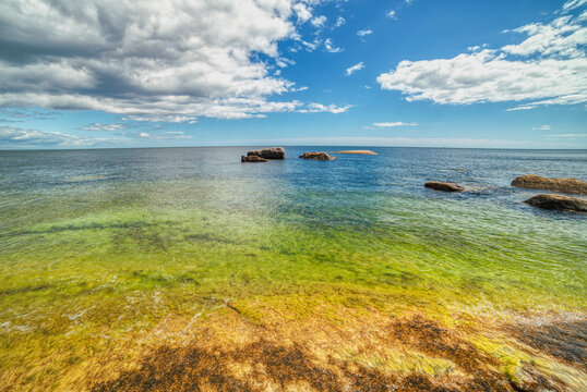 Spotless hidden gem and natural clear swimming pool in Vindhalla on the Swedish island of Hano. Isle of Han&ouml; in Sweden at summer is ideal for a peaceful, quiet holiday in a tranquil paradise or heaven