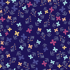 patroon kleine veelkleurige bloemen op een donkerblauwe achtergrond