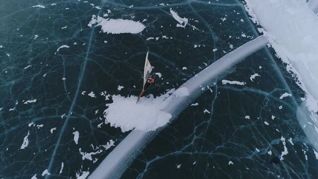 Winter sports on Baikal. Buer. Sailing on skates on the ice of the lake