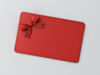 Blank red gift card with red ribbon bow isolated on grey background with shadow minimal conceptual 3D rendering