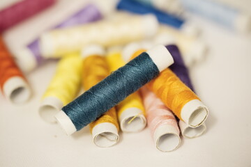 Fototapeta na wymiar Colored thread, sewing, fabric
