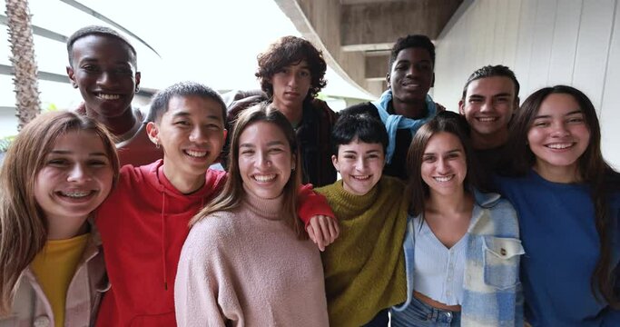 Young multiracial friends having fun together outdoor at university campus