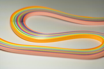 Colored paper strips, background textures, rainbow paper