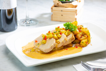 Chicken fillet with a tasty sauce. Dishes with chicken fillets are always quick to prepare. Serve with boiled potatoes that you mash in the tasty sauce. soft focus.shallow focus effect.