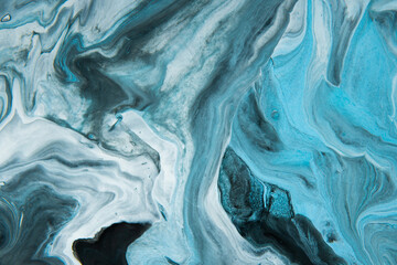 Painting on canvas. Modern art. Mixing paints. Fluid Art.
