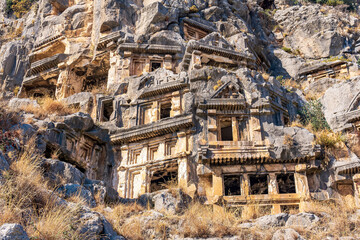 antique stone-cut tombs carved in the ruins of Myra (Demre, Turkey)