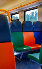Fototapeta premium train seats in different bright colors