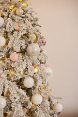 Snowy vintage christmas tree decorations with white baubles ornaments