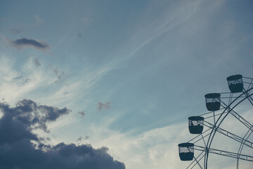 4 silhouette cabin of ferris wheel in the sky in evening