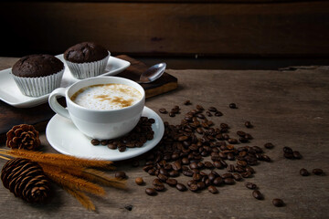 Chocolate cake and a cup of coffee served in the morning.