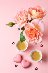 Fototapeta na wymiar Romantic setup with coffee, macarons and roses