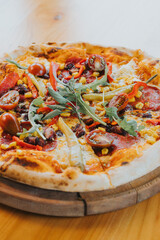 pizza on a wooden table