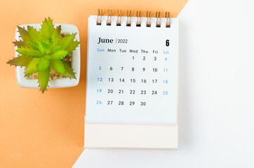 June 2022 desk calendar with tree pot.