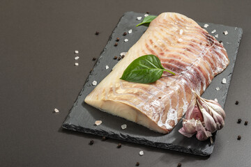 Raw pollock (Pollachius virens) fillet. Fresh fish for healthy food lifestyle
