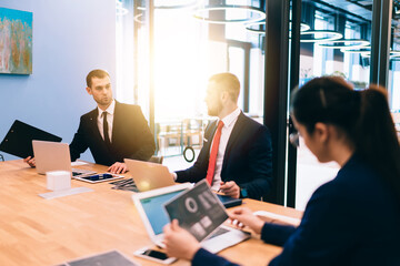 Group of colleagues brainstorming in office