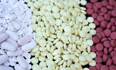 Background from a heap of pills of different colors.