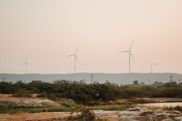 View of the windmills on the hills during the sunset at Wankaner, Gujarat, India