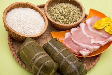 Vietnamese food for Tet holiday in spring, it is traditional food on lunar new year: Cylindric glutinous rice cake, dried shrimp, pickled small leeks,