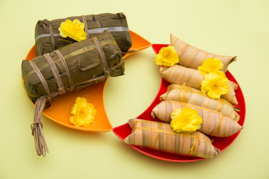 Vietnamese food for Tet holiday in spring, it is traditional food on lunar new year: Cylindric glutinous rice cake, dried shrimp, pickled small leeks,