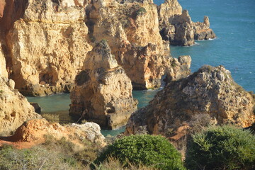 view of the rocky coast of the region Algarve in Portugal