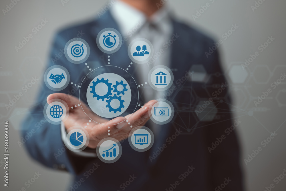 Poster With gears and icons in the backdrop and a connecting line network, a diagram of business process management and workflow automation is shown. The interface is being interacted with by the manager.