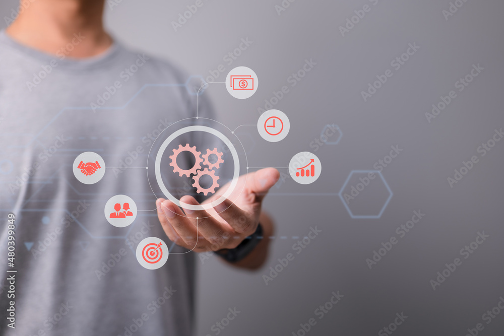 Poster Diagram of business process management and workflow automation with gears and icons in the backdrop and a connecting line network. Manager interacting with the interface.